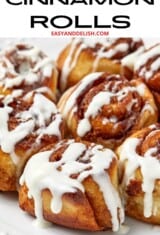 close up air fryer cinnamon rolls with cream cheese frosting