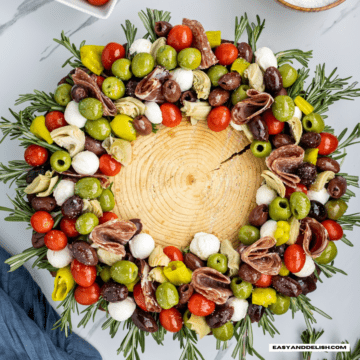 close up of antipasto salad arranged as a Christmas wreath.