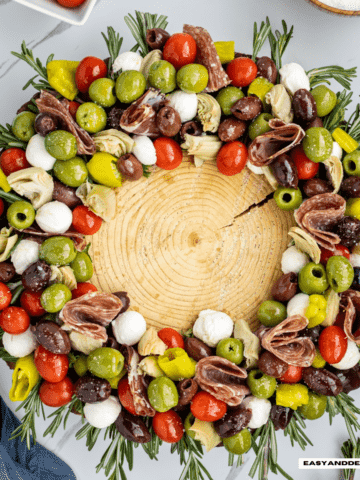 close up of antipasto salad arranged as a Christmas wreath.