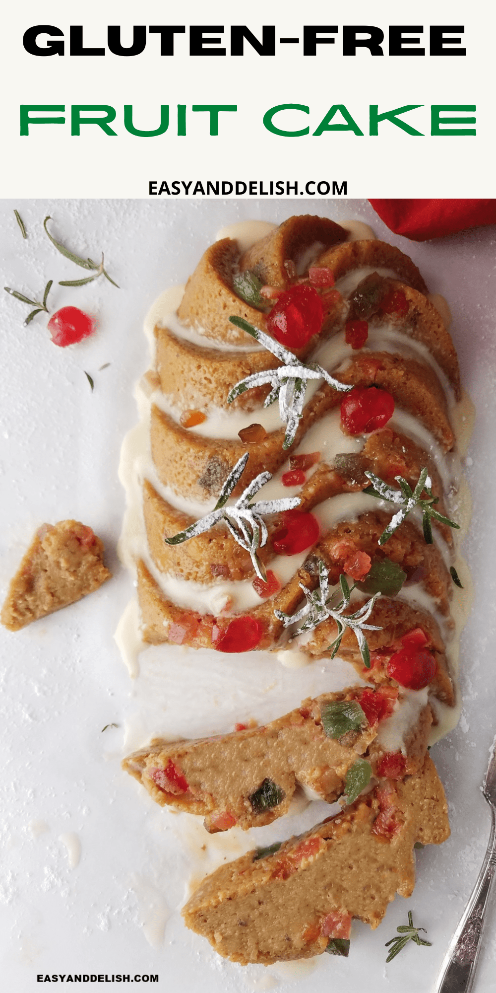 CLOSE UP PIN OF GLUTEN-FREE FRUIT CAKE WITH GARNISHES ON THE SIDES.