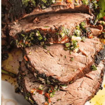 close up sliced reverse sear smoked beef tenderloin roast.