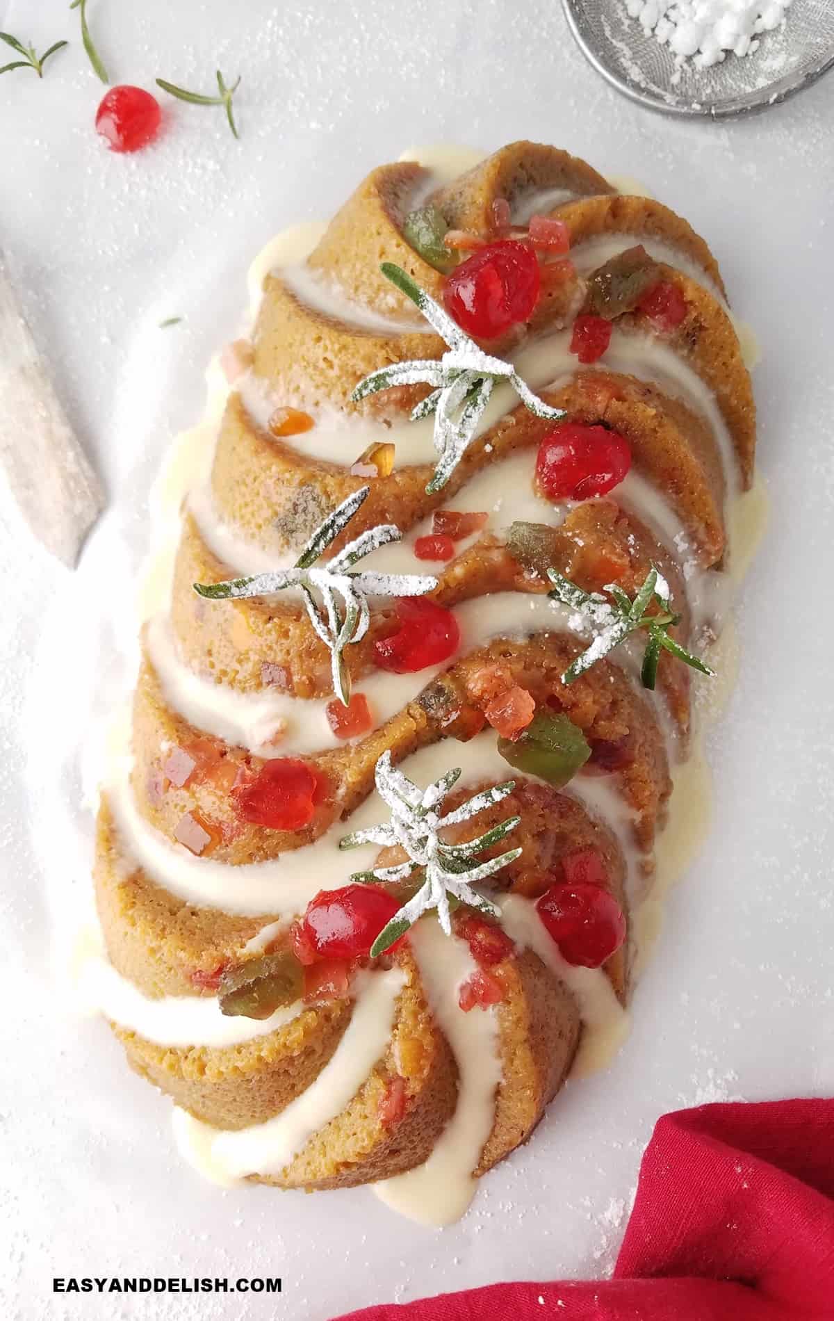 whole Christmas fruit cake iced and decorated.