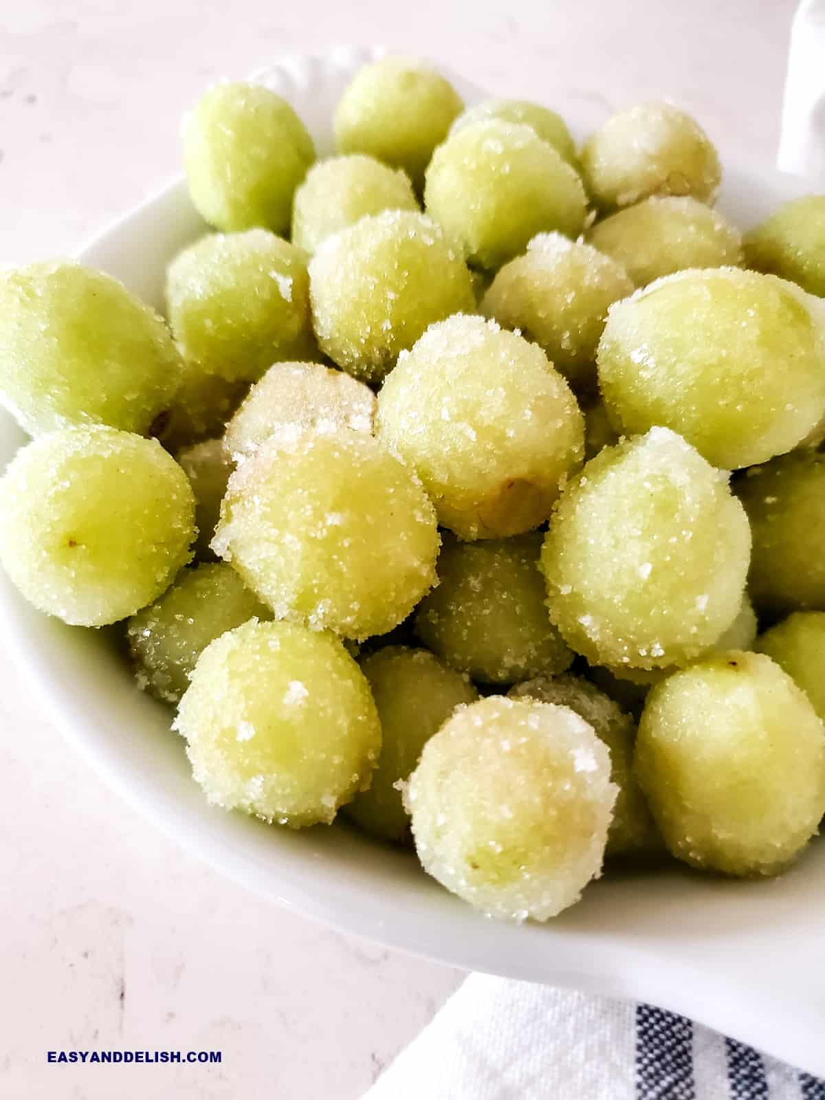 a large bowl of sugared champagne grapes