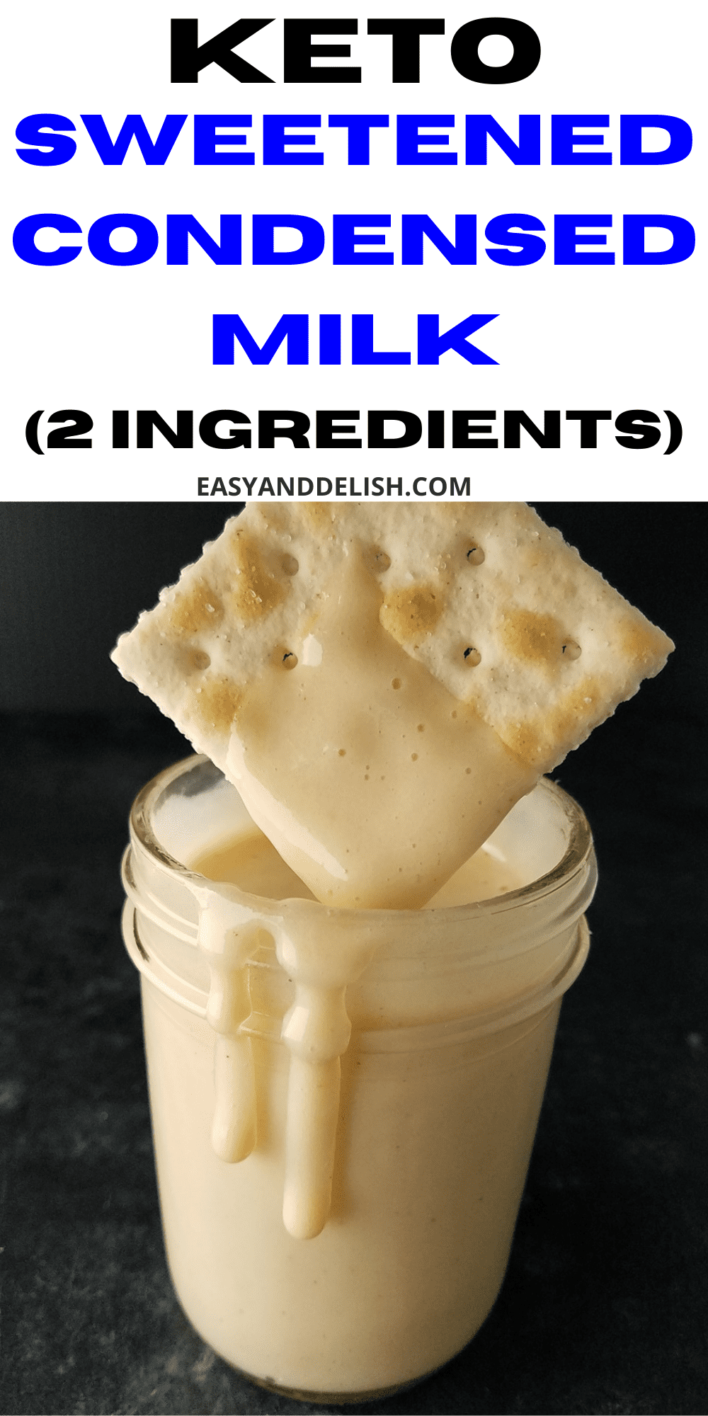 a cracker dipped in keto condensed milk and held over a jar.