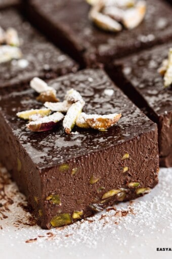 close up of a slice of no bake sugar-free brownies surrounded by others