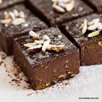 close up of a slice of no bake sugar-free brownies surrounded by others