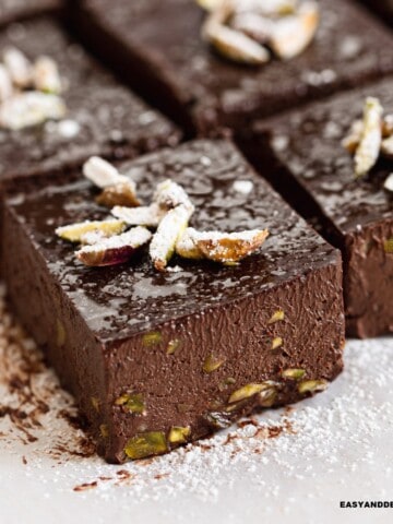 close up of a slice of no bake sugar-free brownies surrounded by others