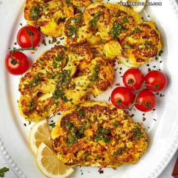 a platter full of cauliflower steak.