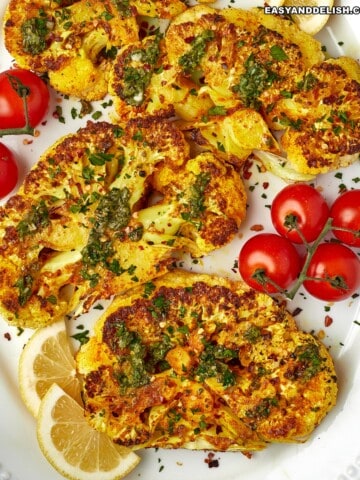 a platter full of cauliflower steak.