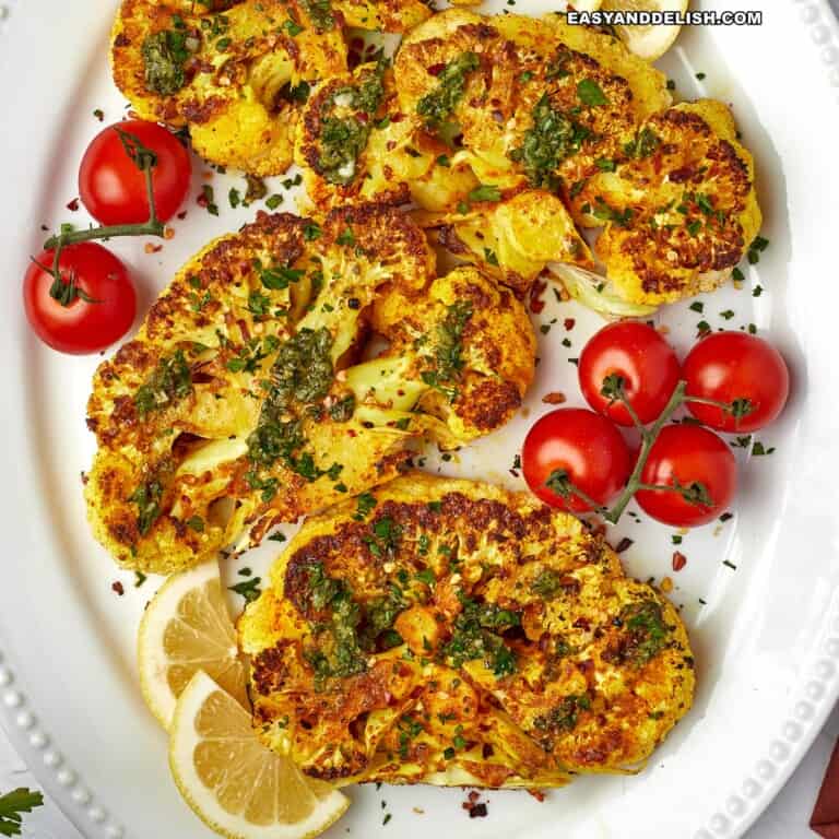 a platter full of cauliflower steak.