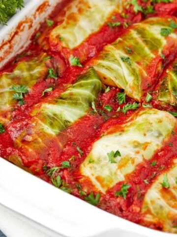 A BAKING DISH WITH KETO CABBAGE ROLLS.