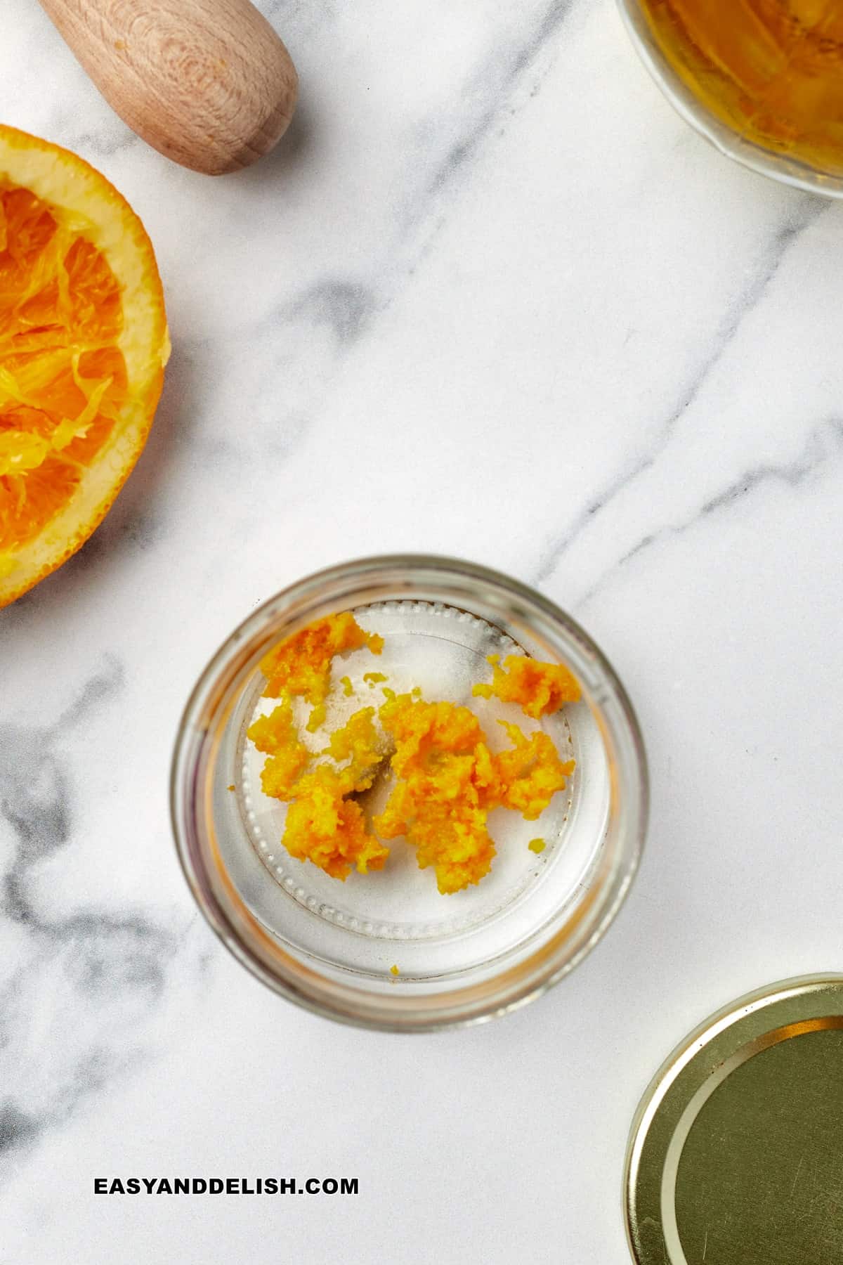 a small bowl with orange zest.