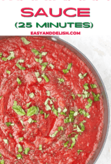 close up of a half skillet of healthy marinara sauce with fresh herbs on top.