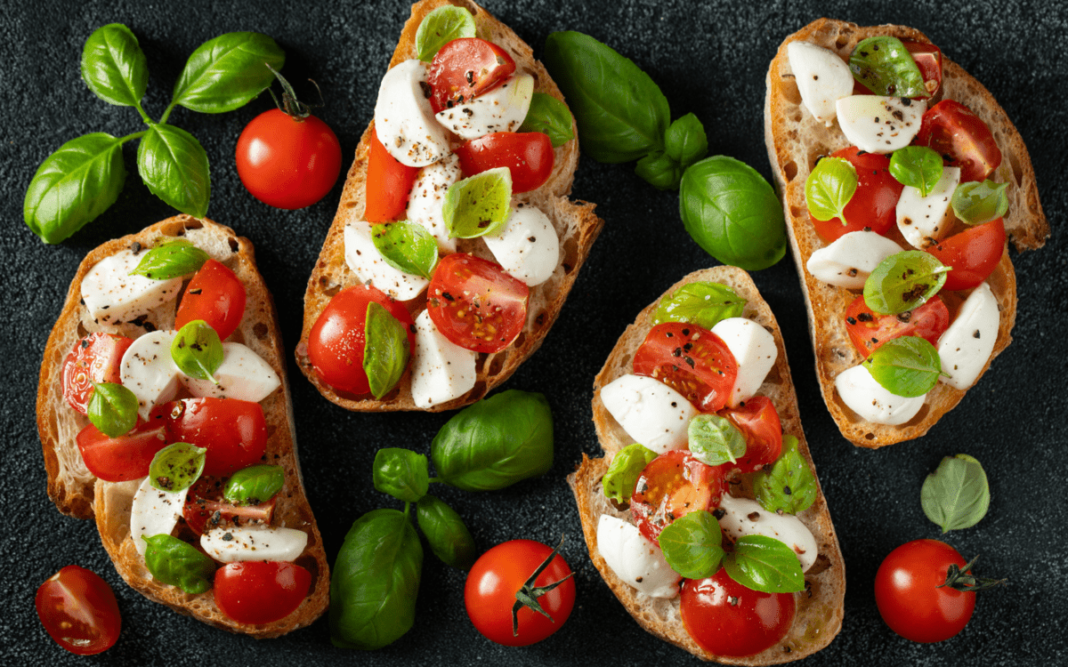 toast with tomato, mozzarella, and basil.