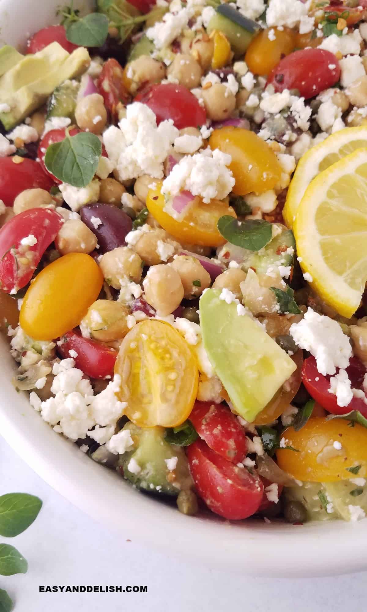 close up of a fourth of the Mediterranean chickpea salad.