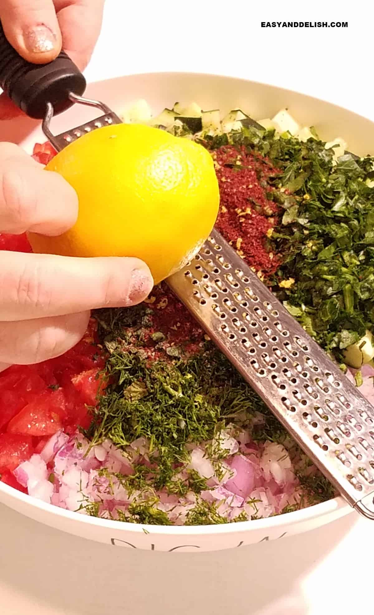 zest of lemon added to a bowl.