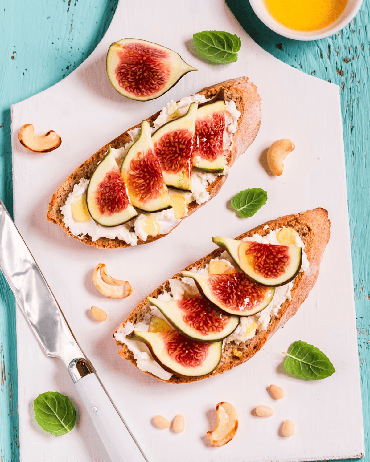 toasted sourghbread slice with whipped cheese, figs, and honey.