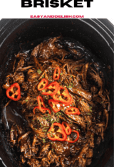 close up of slow cooker pulled beef brisket with bbq sauce.