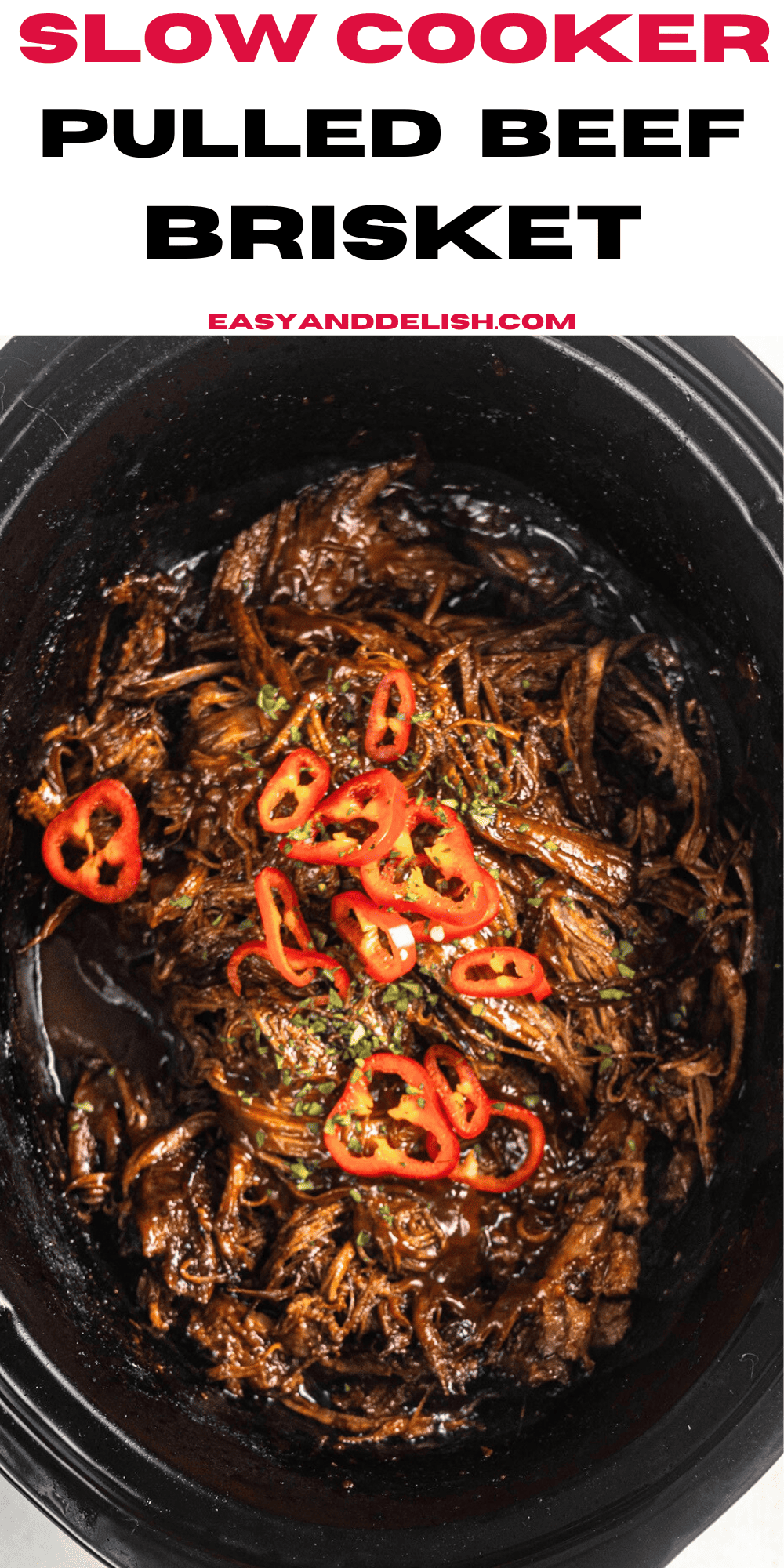 close up of slow cooker pulled beef brisket with bbq sauce.
