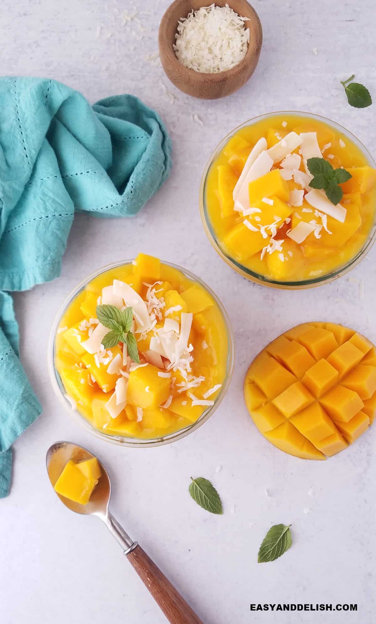 mango coconut chia pudding on a table as part of meal prep breakfast for the week and for weight loss. 