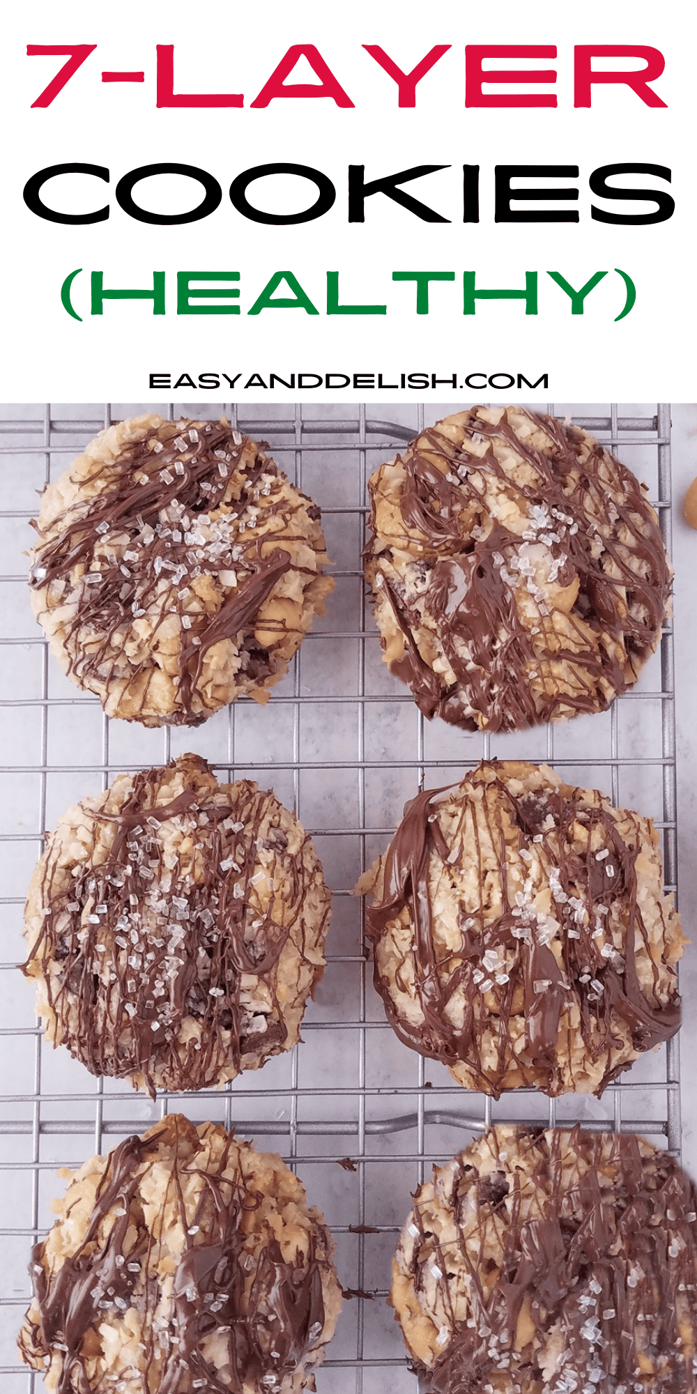 pin showing several 7 layer cookies over a cookie rack. 