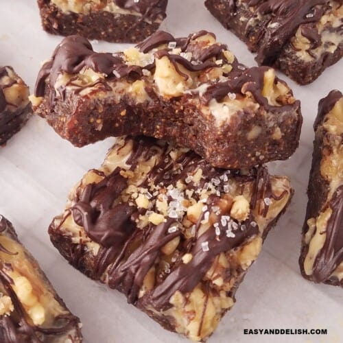 close up of two fig bars, one whole and one bitten partially on top.