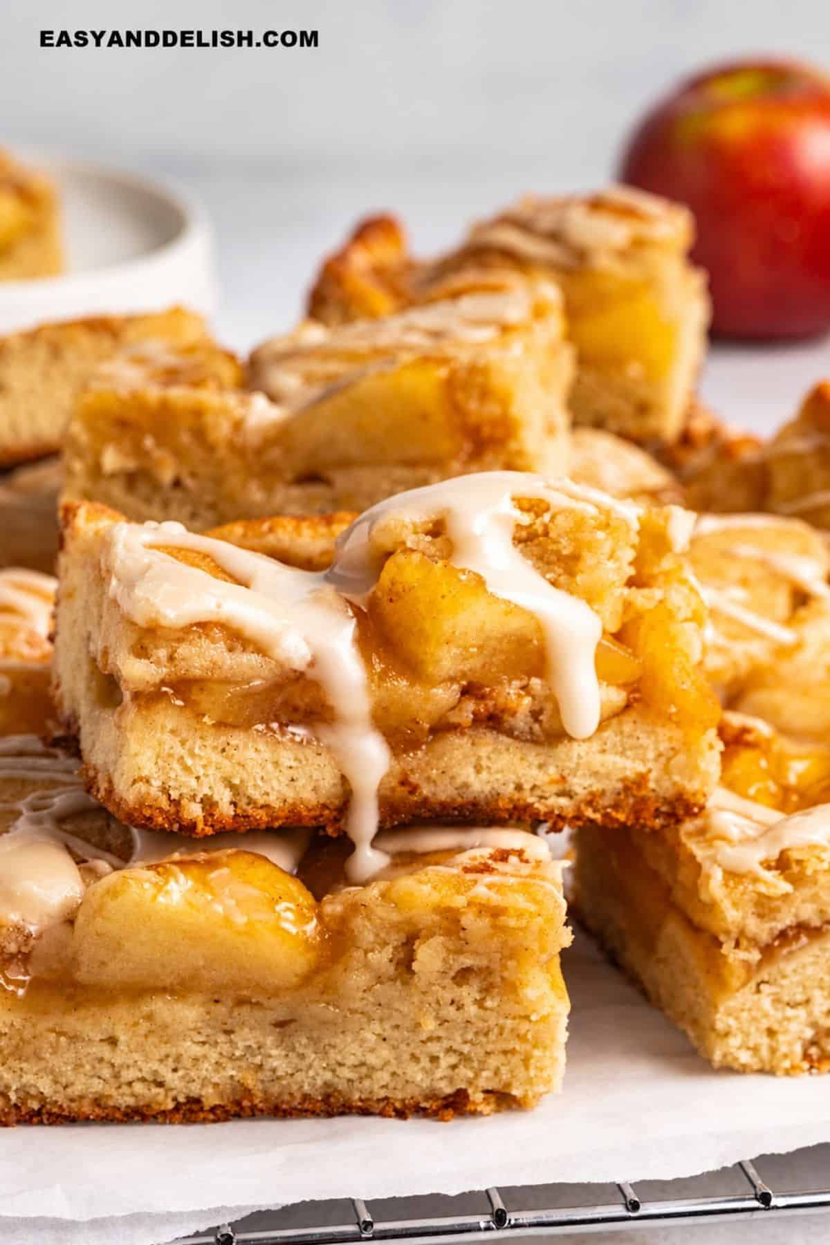 Apple pie bars with apple filling and vanilla glaze.