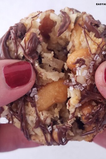 close up of one 7 layer cookie being teared apart.