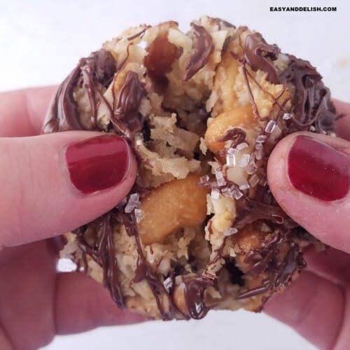 close up of one 7 layer cookie being teared apart.