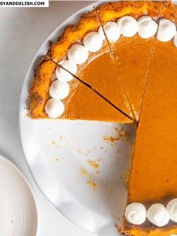 close up of a partially sliced keto pumpkin pie.