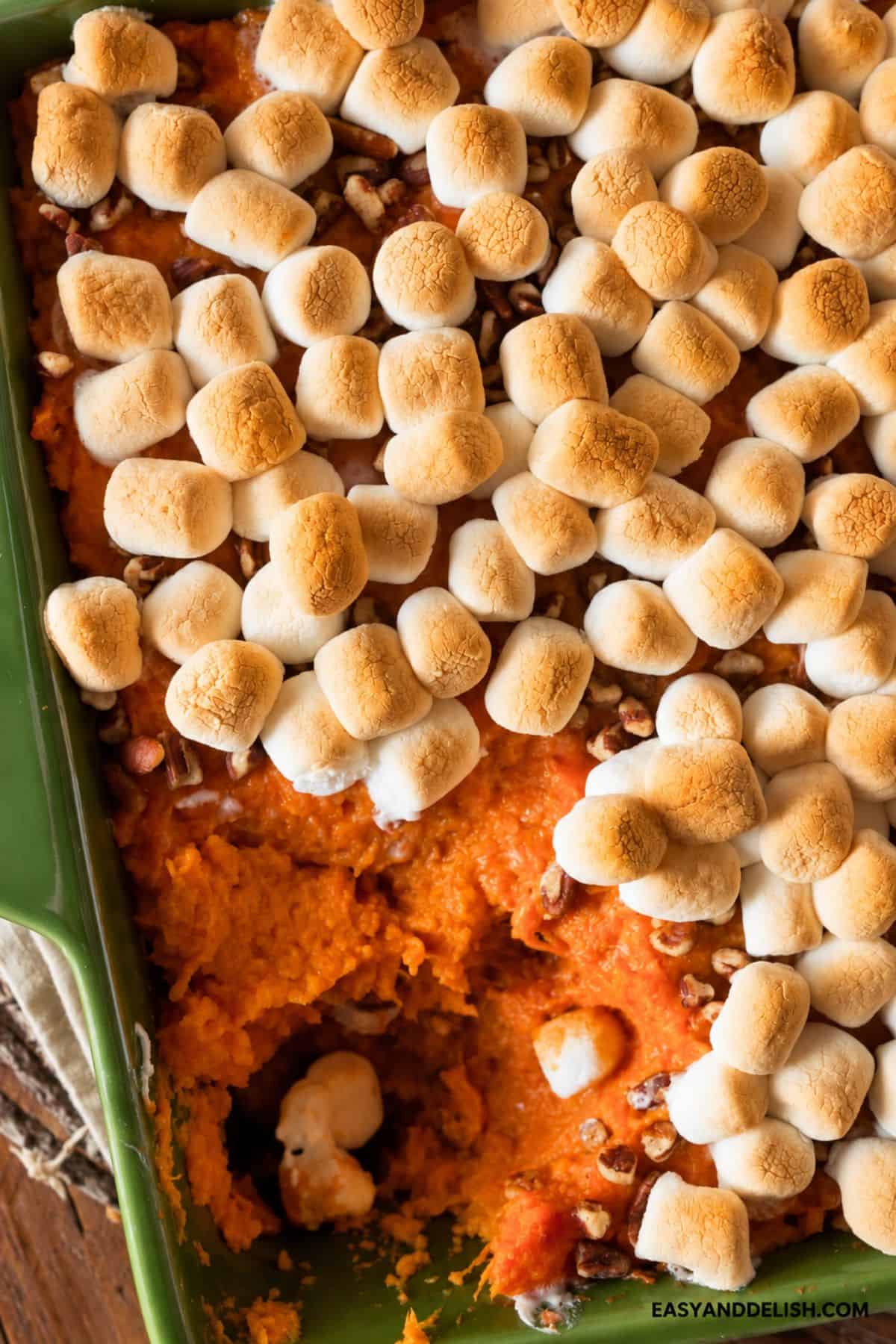 Baked sweet potato mixture covered with golden toasted marshmallows and pecans.