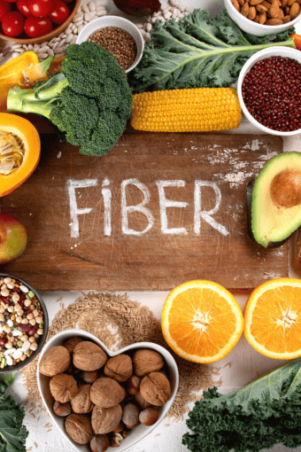 a table full of high fiber foods with a sign that says 'fiber".