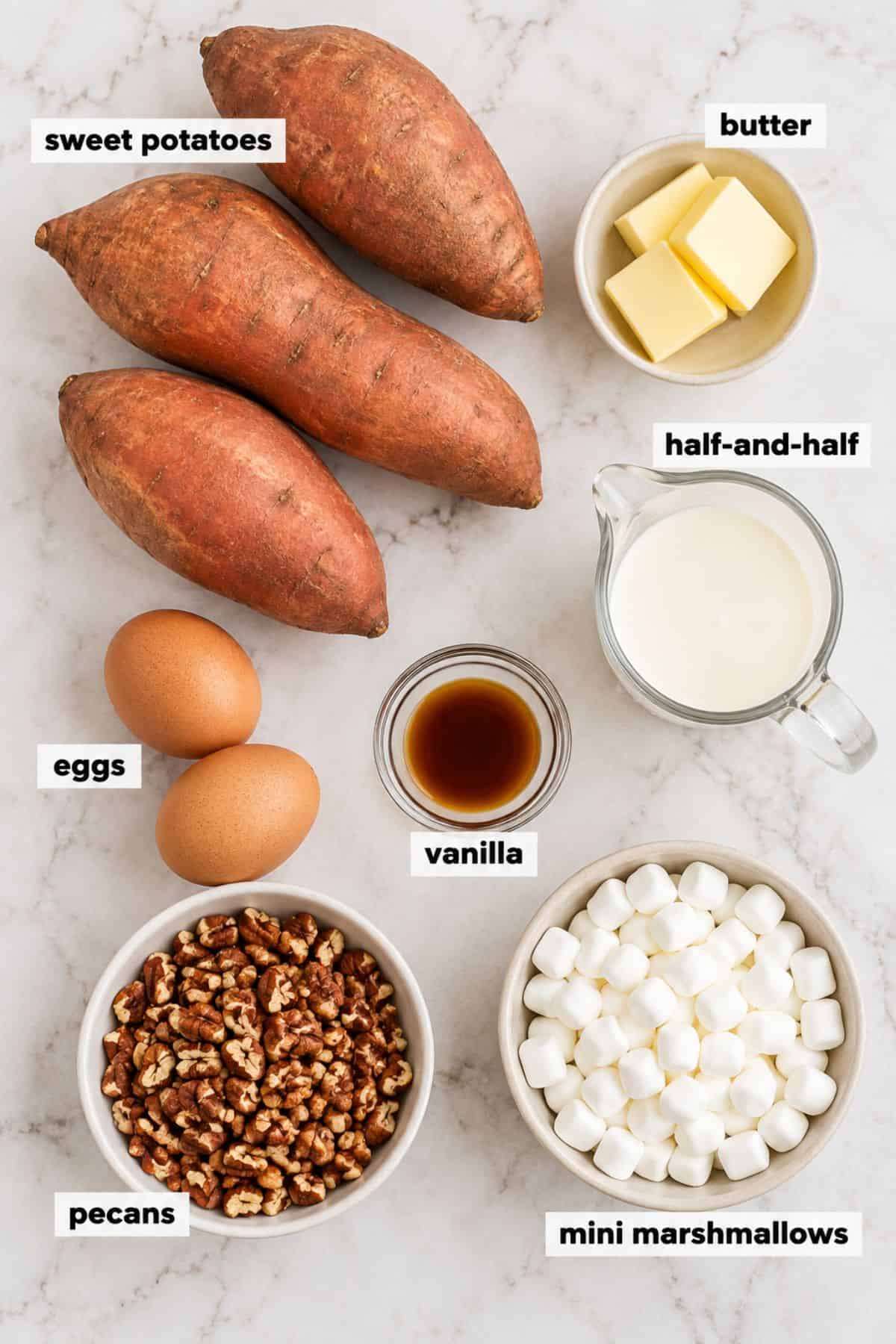 Sweet potato casserole ingredients with pecans and mini marshmallows.