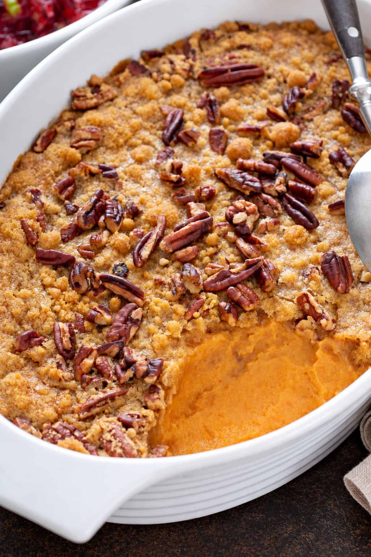Sweet potato casserole topped with a brown sugar pecan crumble.