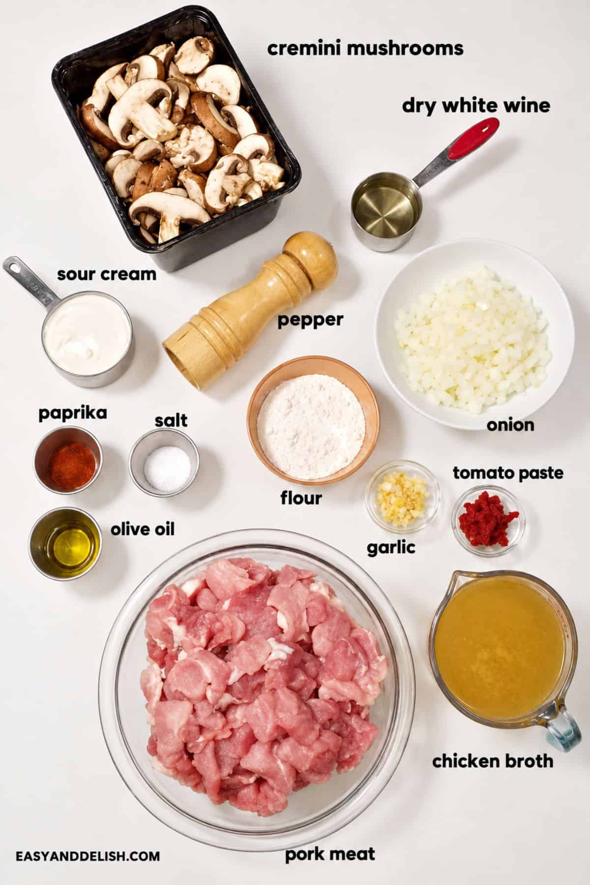 Pork, mushrooms, sour cream, broth, wine, and seasonings for Pork Stroganoff.