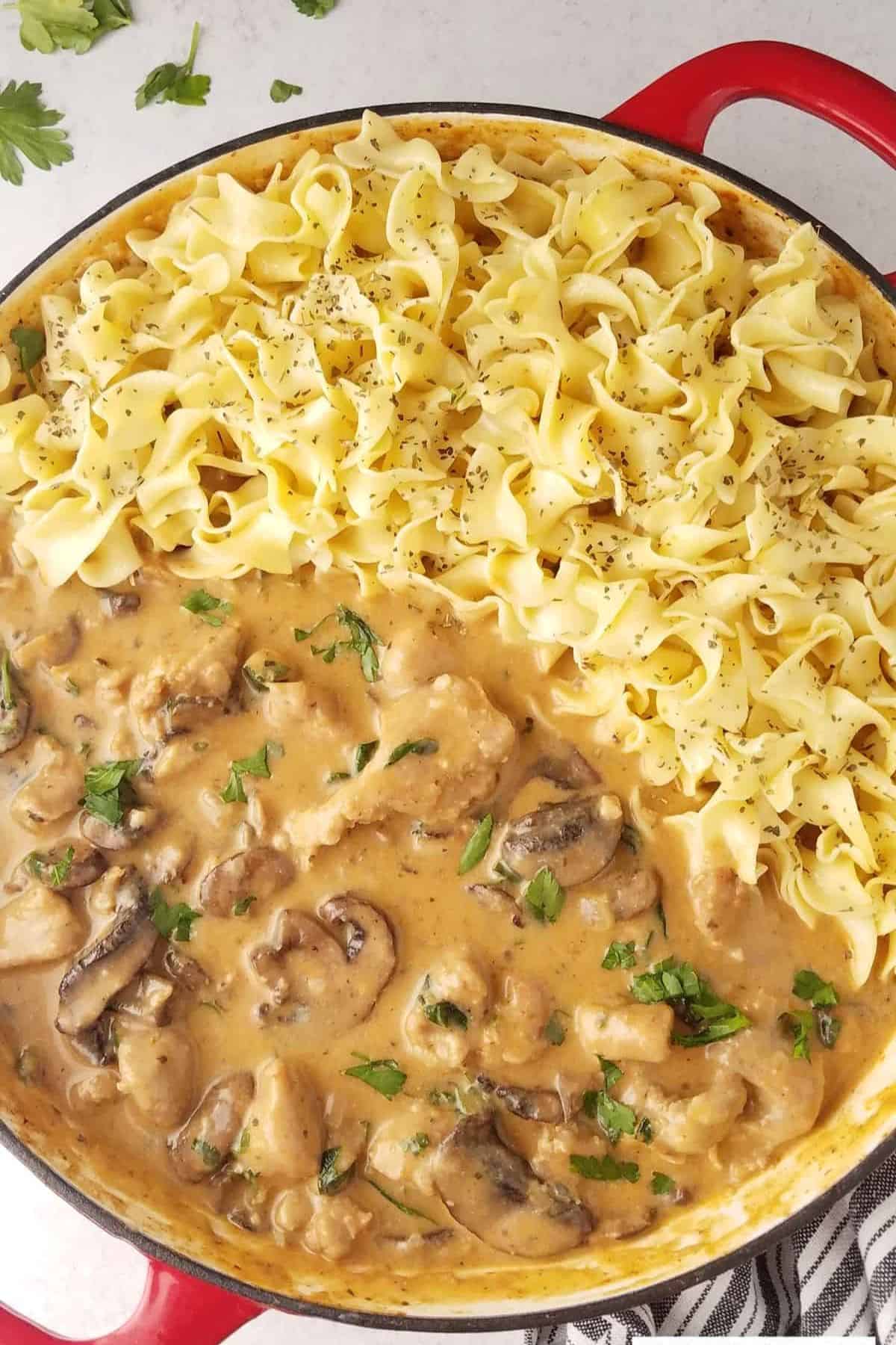 Creamy pork and mushrooms served beside egg noodles.