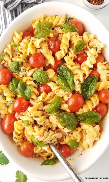 Close up of Baked feta pasta in a baking dish.