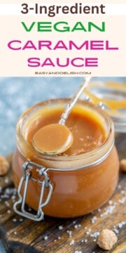 Close up of a jar and a spoon with vegan caramel sauce topped with sea salt flakes.
