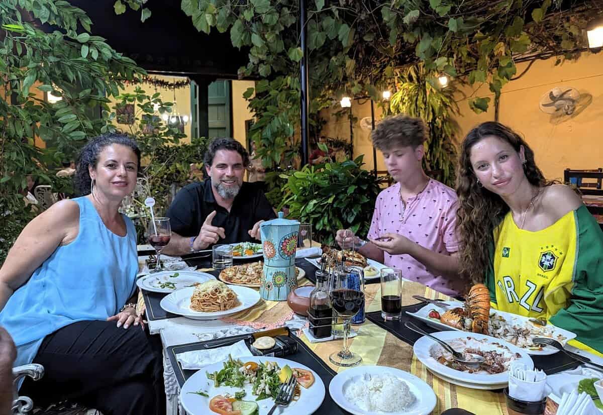 Family around dinner table