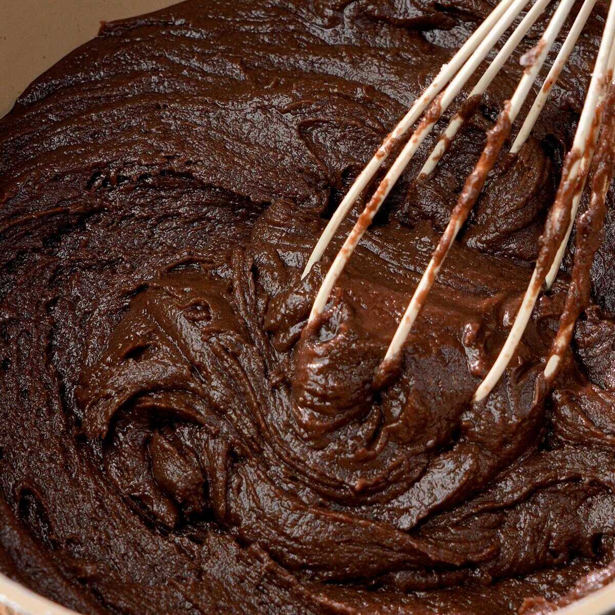 Stirring the mixture until smooth and creamy.