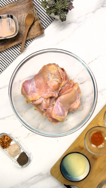 raw chicken thighs pat dried with paper towels