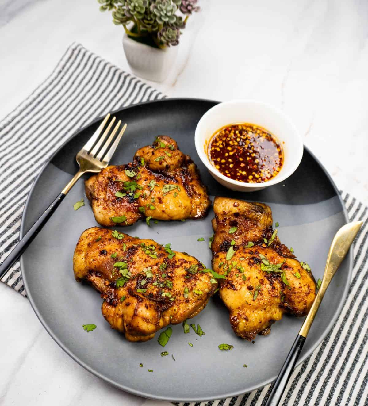 crispy oven baked hot honey chicken thighs fresh from oven