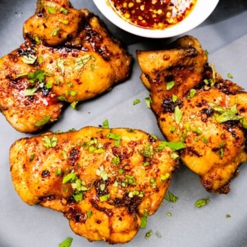 crispy oven baked hot honey chicken thighs fresh from oven