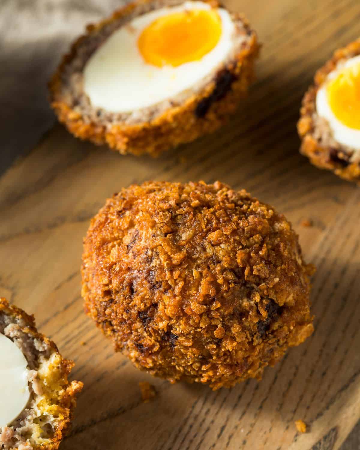 Close up of the completed Scotch Eggs dish served. 