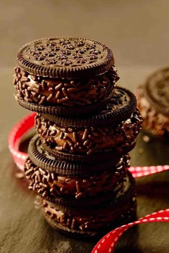 Chocolate brigadeiro cookies arranged on top of each other.